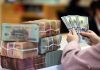 Strong surge in USD, hits historic milestone of 25,700 VND