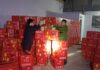 Unveiling the Secret Stash: A Raid Uncovers Hundreds of Boxes with a Red Apple Logo in Bac Giang