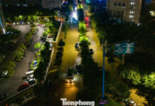 Flash Floods Submerge Cars in Hanoi Streets, Emergency Rescues Continue Through the Night