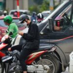 Is Using Your Mobile Phone at a Red Light a Ticketable Offense?