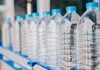 Raid on Warehouse Uncovers Massive Counterfeit Bottled Water Operation, Owner Identified as Son of Former City Council Chairman