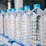 Raid on Warehouse Uncovers Massive Counterfeit Bottled Water Operation, Owner Identified as Son of Former City Council Chairman