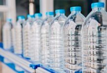 Raid on Warehouse Uncovers Massive Counterfeit Bottled Water Operation, Owner Identified as Son of Former City Council Chairman
