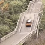 Chinese SUV Plunges Down Cliff, Smashing Railing After Attempting to Climb 999 Steps to Mountain Peak