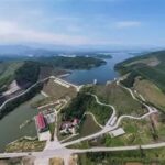Smart Dam Management in the Face of New Challenges: The Need for Standardized Databases and Intelligent Operating Systems