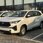 Toyota Innova Cross Budget Variant Spotted at Dealership Ahead of Launch: Retains Premium Features Like Leather Seats, Electronic Handbrake, and 6 Airbags